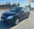 Черный Шевроле Орландо, объемом двигателя 2 л и пробегом 179 тыс. км за 9800 $, фото 1 на Automoto.ua
