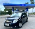 Чорний Шевроле Орландо, об'ємом двигуна 2 л та пробігом 141 тис. км за 10000 $, фото 1 на Automoto.ua