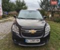Черный Шевроле Орландо, объемом двигателя 2 л и пробегом 194 тыс. км за 9500 $, фото 1 на Automoto.ua