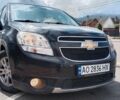 Черный Шевроле Орландо, объемом двигателя 2 л и пробегом 212 тыс. км за 8500 $, фото 1 на Automoto.ua
