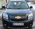 Черный Шевроле Орландо, объемом двигателя 1.8 л и пробегом 142 тыс. км за 10900 $, фото 1 на Automoto.ua