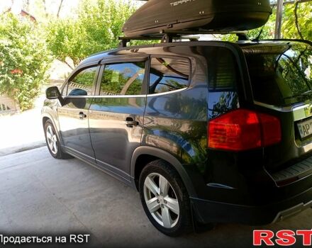 Черный Шевроле Орландо, объемом двигателя 1.8 л и пробегом 194 тыс. км за 7900 $, фото 1 на Automoto.ua