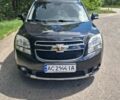 Черный Шевроле Орландо, объемом двигателя 2 л и пробегом 190 тыс. км за 9500 $, фото 1 на Automoto.ua