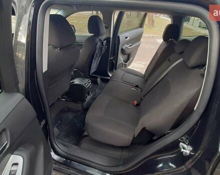 Черный Шевроле Орландо, объемом двигателя 1.8 л и пробегом 65 тыс. км за 10000 $, фото 2 на Automoto.ua