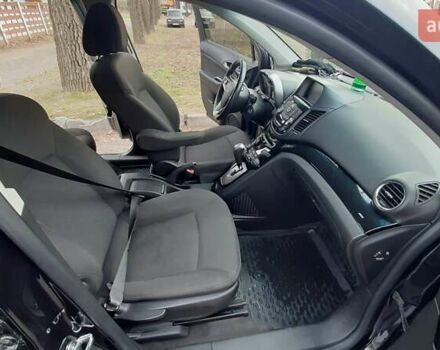 Черный Шевроле Орландо, объемом двигателя 1.8 л и пробегом 65 тыс. км за 10000 $, фото 10 на Automoto.ua