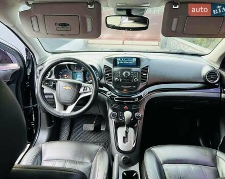 Черный Шевроле Орландо, объемом двигателя 2 л и пробегом 290 тыс. км за 11600 $, фото 3 на Automoto.ua