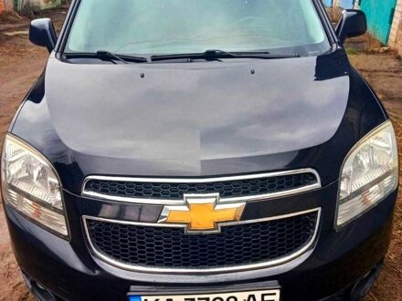 Черный Шевроле Орландо, объемом двигателя 1.8 л и пробегом 269 тыс. км за 8555 $, фото 1 на Automoto.ua