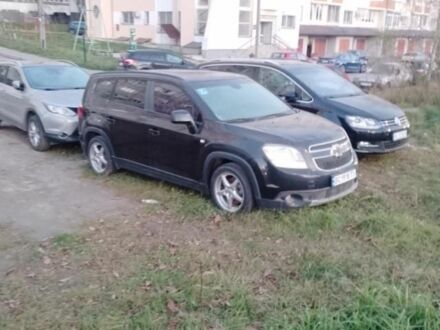 Черный Шевроле Орландо, объемом двигателя 1.8 л и пробегом 160 тыс. км за 7700 $, фото 1 на Automoto.ua