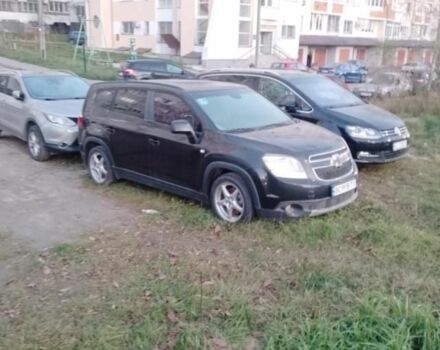 Черный Шевроле Орландо, объемом двигателя 1.8 л и пробегом 160 тыс. км за 7700 $, фото 1 на Automoto.ua