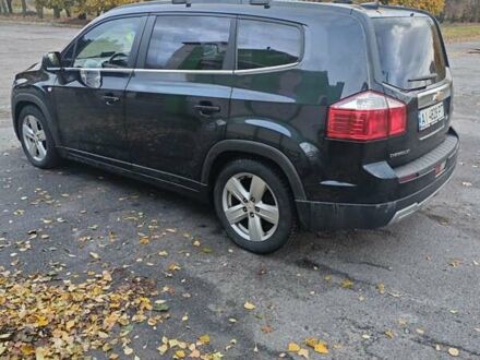 Черный Шевроле Орландо, объемом двигателя 2 л и пробегом 210 тыс. км за 8800 $, фото 1 на Automoto.ua