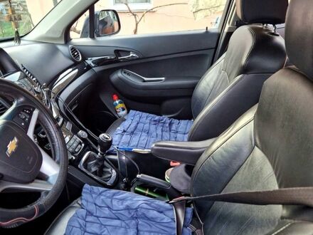 Черный Шевроле Орландо, объемом двигателя 1.8 л и пробегом 310 тыс. км за 7800 $, фото 1 на Automoto.ua