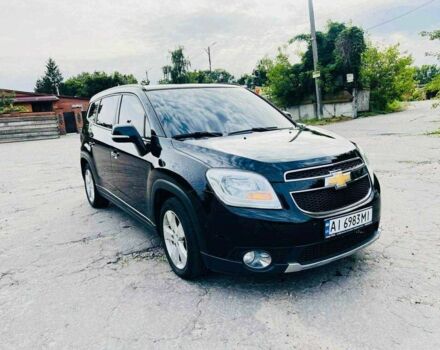 Черный Шевроле Орландо, объемом двигателя 2 л и пробегом 290 тыс. км за 11600 $, фото 1 на Automoto.ua