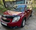 Красный Шевроле Орландо, объемом двигателя 1.8 л и пробегом 264 тыс. км за 9000 $, фото 1 на Automoto.ua