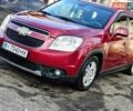 Красный Шевроле Орландо, объемом двигателя 1.8 л и пробегом 235 тыс. км за 8999 $, фото 1 на Automoto.ua