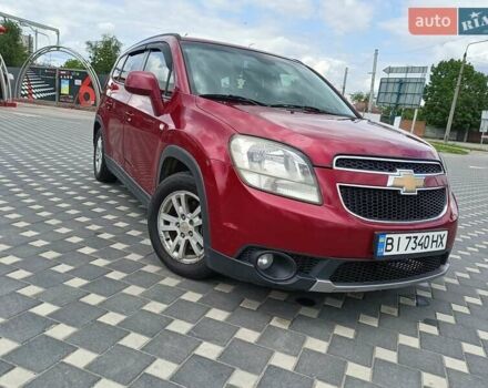 Красный Шевроле Орландо, объемом двигателя 1.8 л и пробегом 233 тыс. км за 9199 $, фото 1 на Automoto.ua