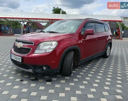 Красный Шевроле Орландо, объемом двигателя 1.8 л и пробегом 233 тыс. км за 9199 $, фото 2 на Automoto.ua