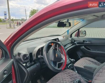 Красный Шевроле Орландо, объемом двигателя 1.8 л и пробегом 233 тыс. км за 9199 $, фото 14 на Automoto.ua