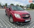 Красный Шевроле Орландо, объемом двигателя 1.8 л и пробегом 233 тыс. км за 9199 $, фото 1 на Automoto.ua