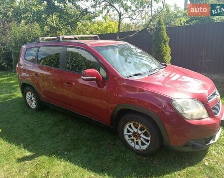 Красный Шевроле Орландо, объемом двигателя 1.36 л и пробегом 303 тыс. км за 9000 $, фото 2 на Automoto.ua