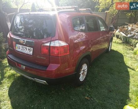Красный Шевроле Орландо, объемом двигателя 1.36 л и пробегом 303 тыс. км за 9000 $, фото 1 на Automoto.ua