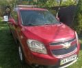 Красный Шевроле Орландо, объемом двигателя 1.4 л и пробегом 303 тыс. км за 9000 $, фото 1 на Automoto.ua
