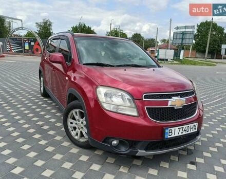Красный Шевроле Орландо, объемом двигателя 1.8 л и пробегом 233 тыс. км за 9199 $, фото 1 на Automoto.ua