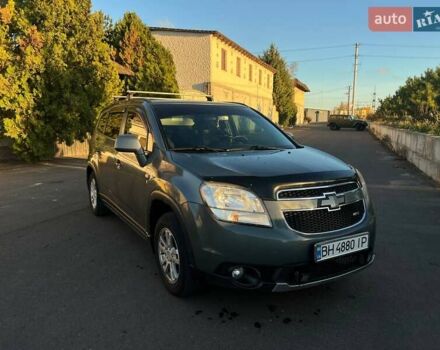 Серый Шевроле Орландо, объемом двигателя 1.8 л и пробегом 245 тыс. км за 9500 $, фото 1 на Automoto.ua