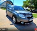Сірий Шевроле Орландо, об'ємом двигуна 2 л та пробігом 320 тис. км за 6900 $, фото 1 на Automoto.ua