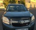 Серый Шевроле Орландо, объемом двигателя 1.8 л и пробегом 245 тыс. км за 9500 $, фото 2 на Automoto.ua