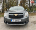Серый Шевроле Орландо, объемом двигателя 1.8 л и пробегом 247 тыс. км за 9600 $, фото 1 на Automoto.ua