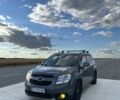 Серый Шевроле Орландо, объемом двигателя 1.8 л и пробегом 174 тыс. км за 8302 $, фото 1 на Automoto.ua