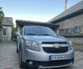 Сірий Шевроле Орландо, об'ємом двигуна 2 л та пробігом 195 тис. км за 8823 $, фото 1 на Automoto.ua