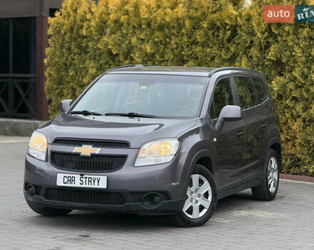 Серый Шевроле Орландо, объемом двигателя 1.8 л и пробегом 217 тыс. км за 7500 $, фото 1 на Automoto.ua