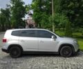 Серый Шевроле Орландо, объемом двигателя 1.8 л и пробегом 200 тыс. км за 7174 $, фото 1 на Automoto.ua