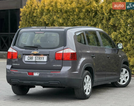 Серый Шевроле Орландо, объемом двигателя 1.8 л и пробегом 217 тыс. км за 7500 $, фото 2 на Automoto.ua