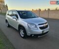 Серый Шевроле Орландо, объемом двигателя 1.8 л и пробегом 153 тыс. км за 11500 $, фото 3 на Automoto.ua