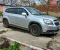 Серый Шевроле Орландо, объемом двигателя 1.8 л и пробегом 124 тыс. км за 9000 $, фото 1 на Automoto.ua