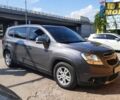 Сірий Шевроле Орландо, об'ємом двигуна 2 л та пробігом 144 тис. км за 11900 $, фото 1 на Automoto.ua