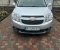 Серый Шевроле Орландо, объемом двигателя 1.8 л и пробегом 66 тыс. км за 13500 $, фото 1 на Automoto.ua