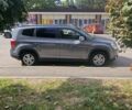 Серый Шевроле Орландо, объемом двигателя 1.6 л и пробегом 247 тыс. км за 11100 $, фото 2 на Automoto.ua