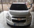 Серый Шевроле Орландо, объемом двигателя 2 л и пробегом 190 тыс. км за 10500 $, фото 1 на Automoto.ua