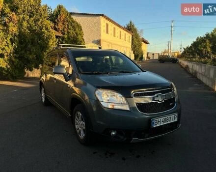 Серый Шевроле Орландо, объемом двигателя 1.8 л и пробегом 245 тыс. км за 9500 $, фото 1 на Automoto.ua