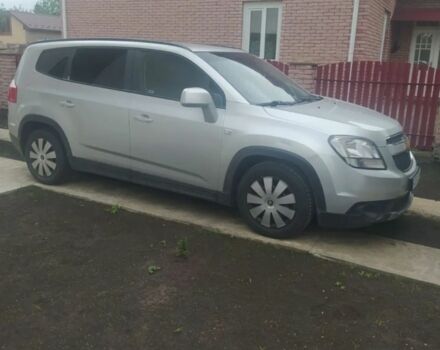 Серый Шевроле Орландо, объемом двигателя 1.8 л и пробегом 250 тыс. км за 7000 $, фото 1 на Automoto.ua