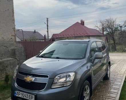 Серый Шевроле Орландо, объемом двигателя 1.8 л и пробегом 180 тыс. км за 10000 $, фото 1 на Automoto.ua