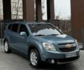 Синій Шевроле Орландо, об'ємом двигуна 2 л та пробігом 228 тис. км за 8229 $, фото 1 на Automoto.ua