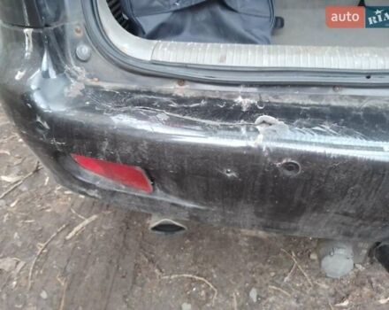 Черный Шевроле Реззо, объемом двигателя 2.01 л и пробегом 331 тыс. км за 1200 $, фото 22 на Automoto.ua