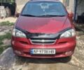 Червоний Шевроле Рєззо, об'ємом двигуна 2 л та пробігом 213 тис. км за 2600 $, фото 1 на Automoto.ua