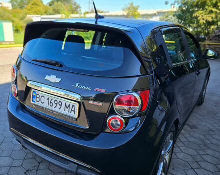 Черный Шевроле Соник, объемом двигателя 1.36 л и пробегом 144 тыс. км за 7500 $, фото 2 на Automoto.ua