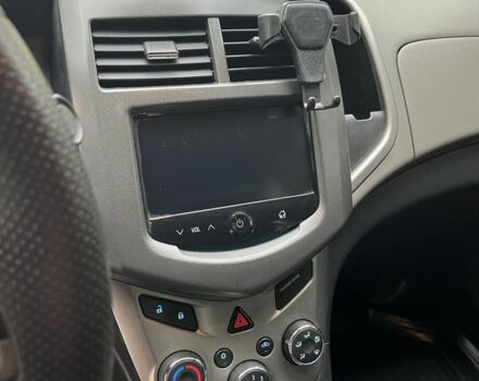 Черный Шевроле Соник, объемом двигателя 1.8 л и пробегом 137 тыс. км за 6500 $, фото 9 на Automoto.ua