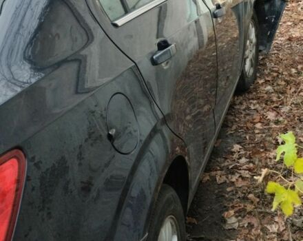 Черный Шевроле Соник, объемом двигателя 1.8 л и пробегом 87 тыс. км за 2400 $, фото 1 на Automoto.ua